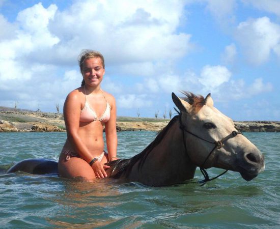 horseback riding in a lagun